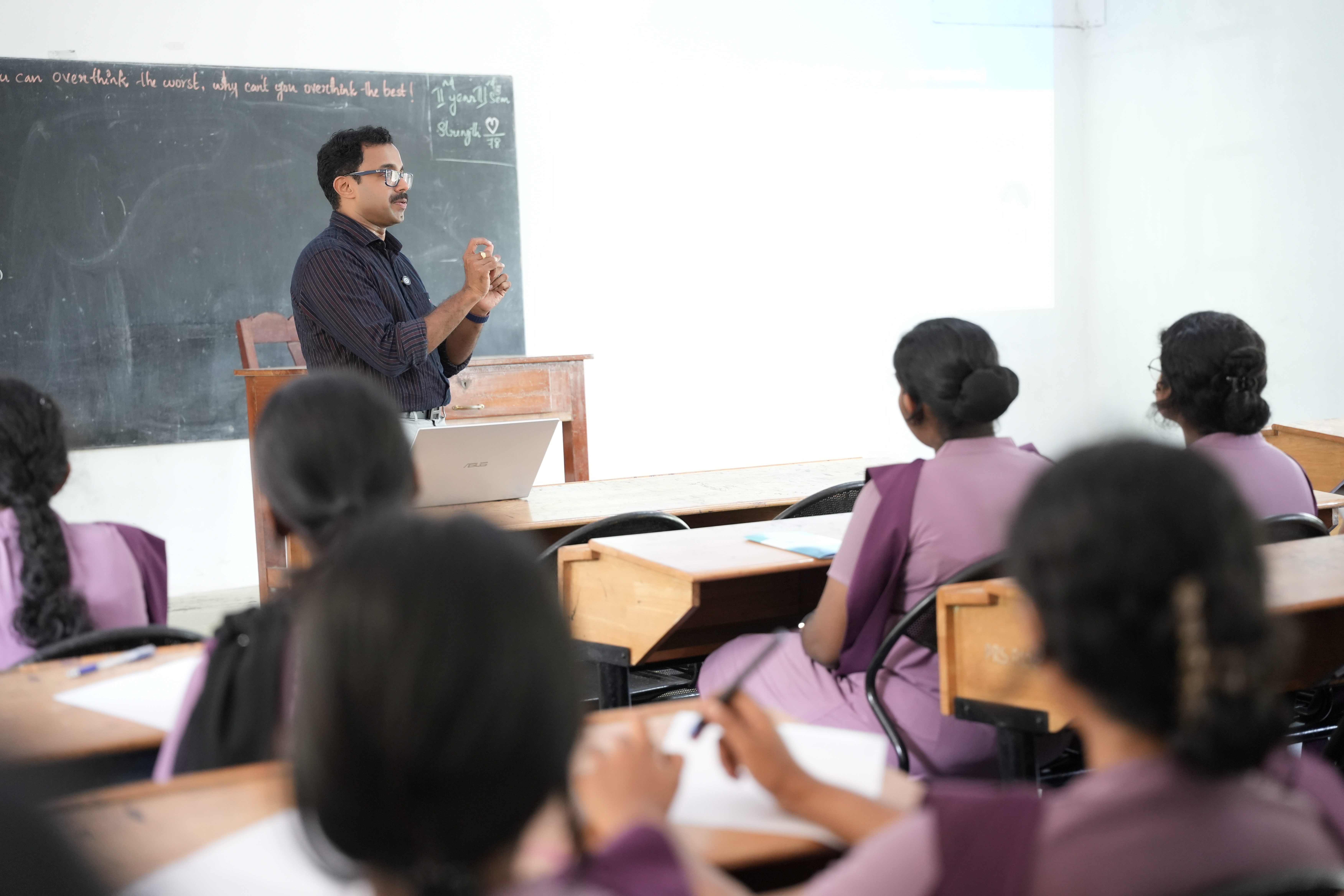 Mentor addressing the classroom while students look on