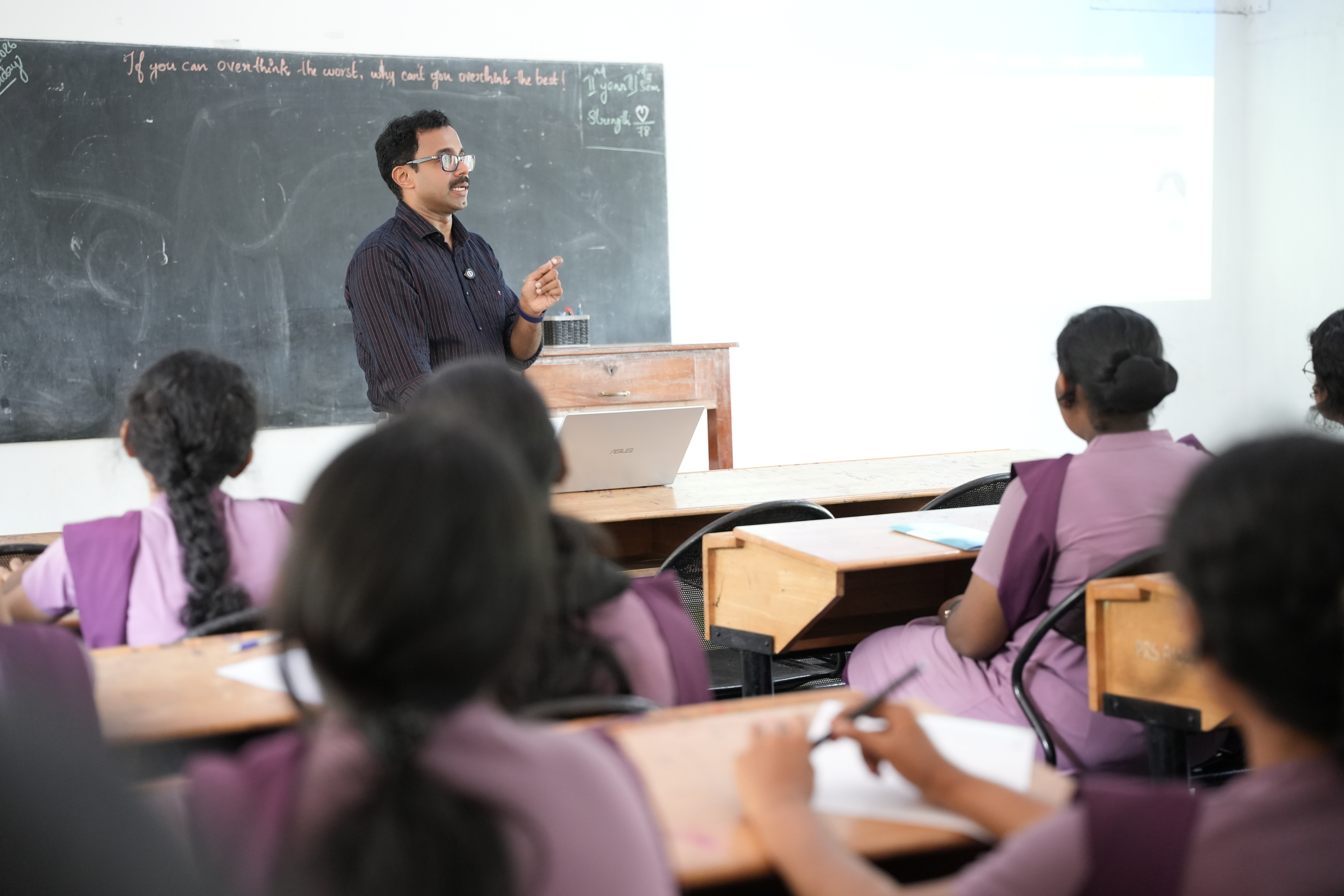 Close-up of a student engaged in the lecture discussion