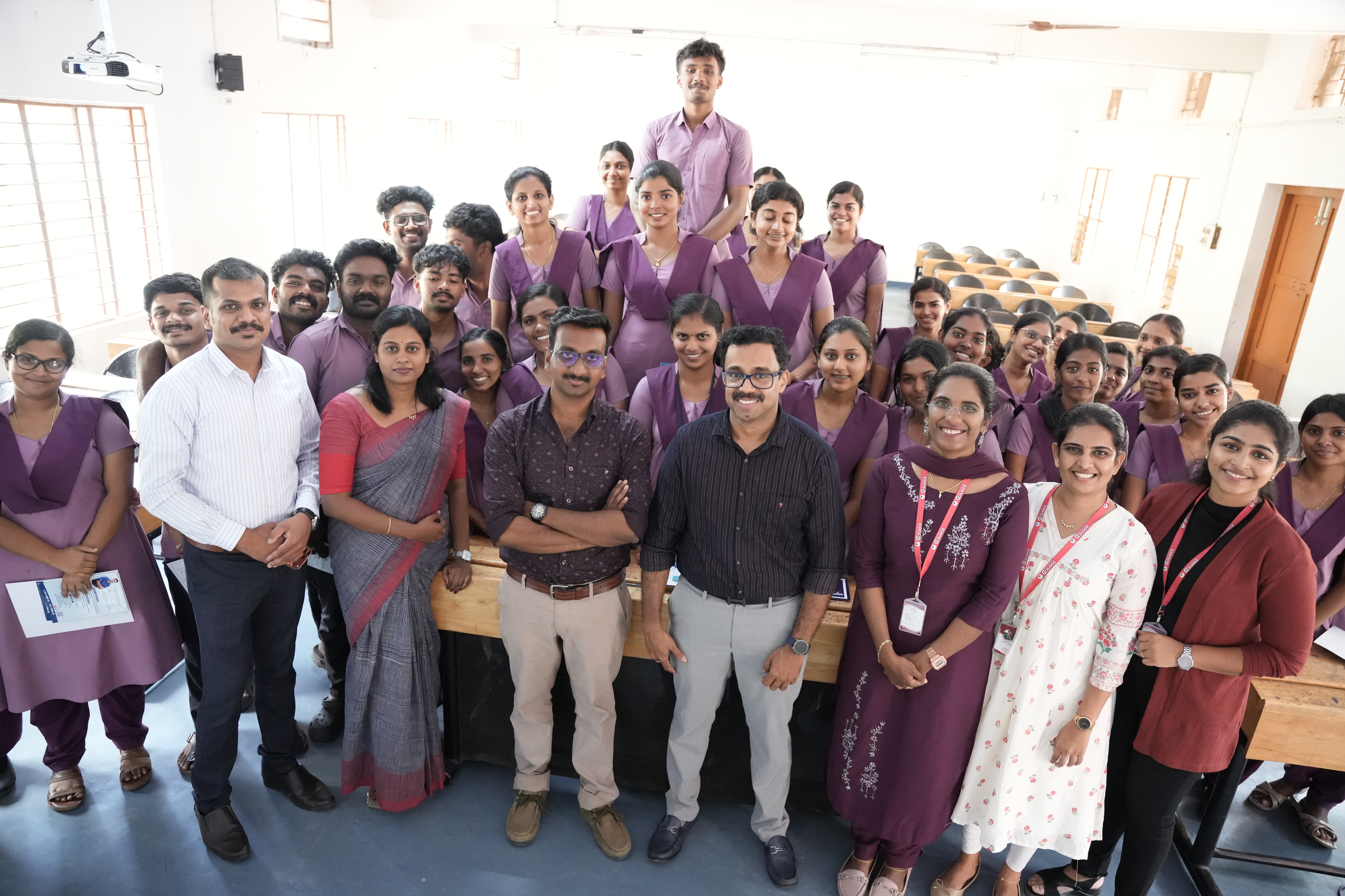 Mentor and student posing together after the certificate ceremony